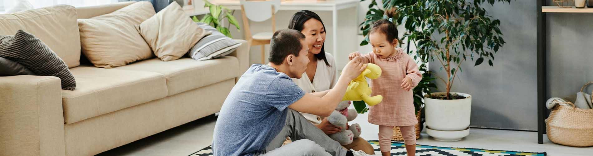 Family playing on floor