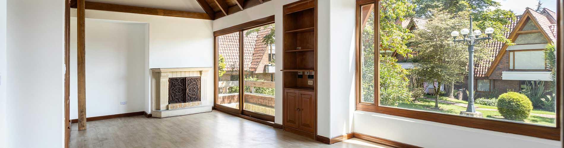 Home remodel with light hardwood floor open wood ceiling