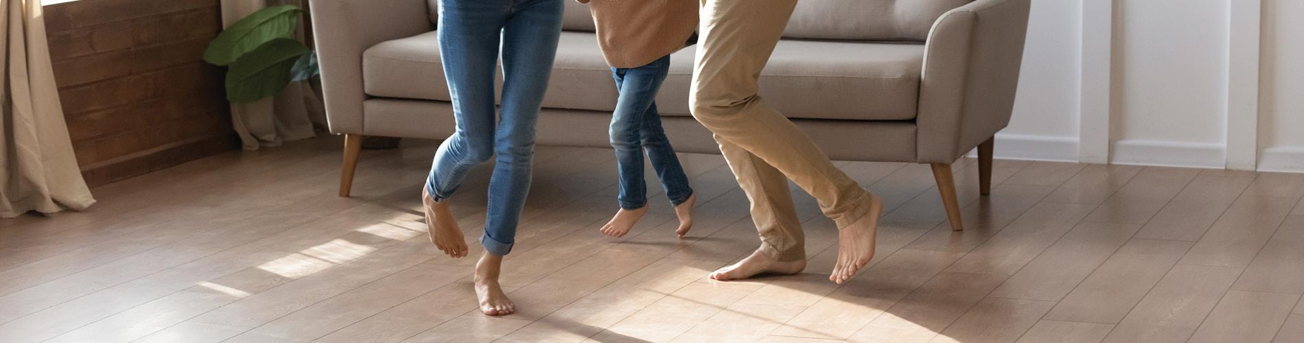 Happy Family Dancing on Luxury Vinyl Plank